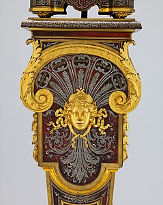Baroque mascaron on the pedestal of a clock, by André Charles Boulle, c.1690, gilt wood, Metropolitan Museum of Art, NYC