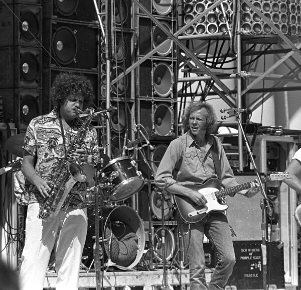 Andy Stein (L) and John Tichy (R) at the Hollywood Bowl opening for Grateful Dead, July 21, 1974. The Wall of Sound PA is in the background. Photo: Da