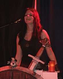 Emmi Silvennoinen playing with Ensiferum in 2009