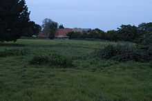 The barn from the south-west at dusk in October 2014 Harmondsworth Great Barn, Middlesex, from the south-west, October 2014.jpg