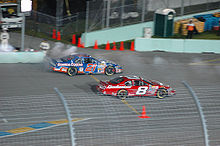 Harvick (#21) during his 2006 Busch championship season, racing Dale Earnhardt Jr. (#8) off pit road Harvick and Junior race out of pit row 303673750.jpg