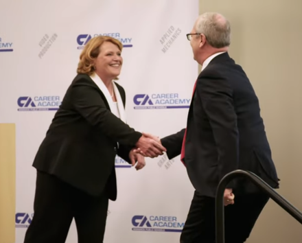 Heitkamp and Cramer greet each other during debate for the 2018 Senate's election.