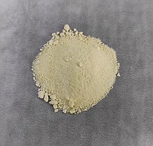 Holmium(III) hydroxide yellow.jpg