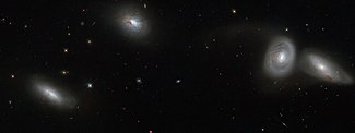 Hubble_views_bizarre_cosmic_quartet_HCG_16.jpg