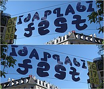 A practical application of mirror ambigrams in a banner reading "Idaplatz fest" front and back (Zurich, 2008).