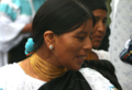 Indigenous woman from Ecuador with a gold tooth.png