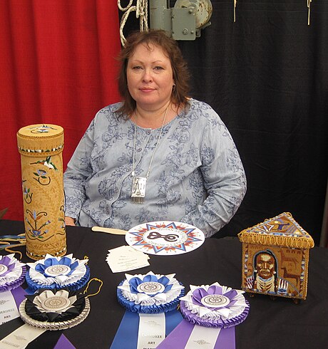 Jackie Larson Bread (enrolled Blackfeet Tribe of Montana) with her award-winning beadwork