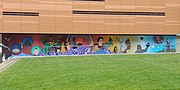 A mural on the side of the library.