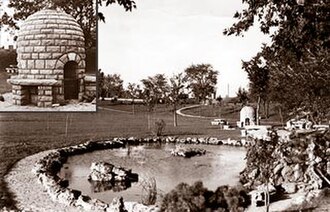 A historic view of Lilac Park with a rock garden and an ornamental pool. The inset shows one of the beehive grills.