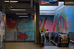 London, Woolwich Arsenal Station, mural MCM.JPG