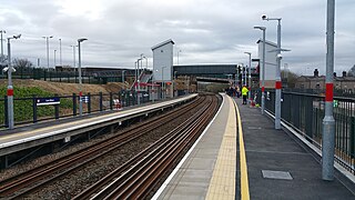 <span class="mw-page-title-main">Low Moor railway station</span> Railway station in West Yorkshire, England