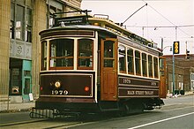 Gomaco-built number 1979, with a trolley pole, in its original livery. By 2003 all of the trolley poles were replaced by pantographs. Memphis car 1979 with trolley pole.jpg