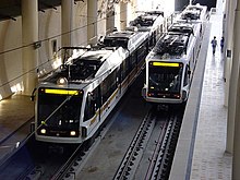 Two Gold Line trains at Memorial Park Station, one of 3 below-grade stations.