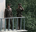 North Korean border troops monitor Conference Row activity from an elevated observation post in the JSA . 37°57′20.14″N 126°40′40.90″E﻿ / ﻿37.9555944°N 126.6780278°E﻿ / 37.9555944; 126.6780278