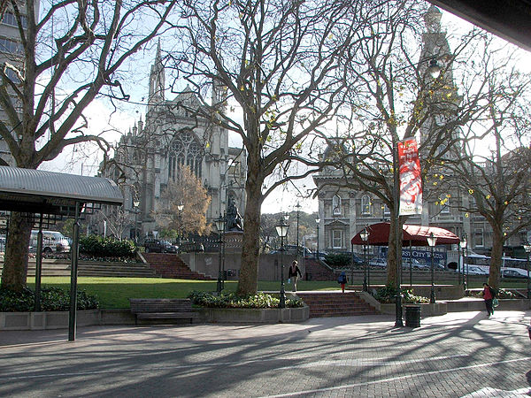 The Octagon, looking towards St. Paul's Cathedral (left) and the Municipal Chambers (Dunedin Town Hall) (right). The Robert Burns statue is visible in