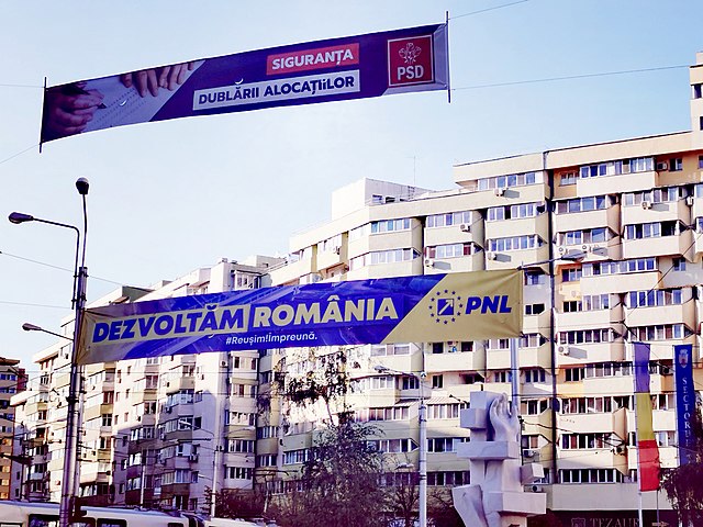 Electoral banner of the PNL (bottom) for the 2020 Romanian legislative election displayed in Bucharest (November 2020). The Romanian caption translate