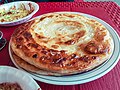 Paratha is a dough fried flatbread native to India and Pakistan.jpg