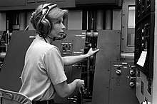 Petty Officer 3rd Class Rosalee Burton, operates a training device designed to simulate in-flight pressure changes on aviators. As a Navy training device trainer, Burton operated, maintained, and taught about Navy training equipment at the Naval Aerospace Medicine Institute. Circa 1982. Petty officer 3rd class burton.jpg
