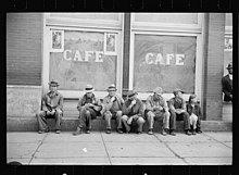 Carl Mydans photo showing local residents "spelling" themselves in front of a Pikeville store in 1936 Pikeville.jpg