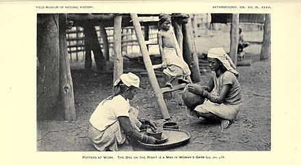 Itneg potters in northern Philippines. The person on the right is biologically male and is wearing women's clothes, a common practice in pre-colonial Philippines.
