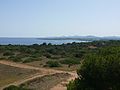 English: View south from defence towser on Punta de n'Amer, Sa Coma in the background