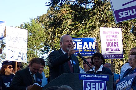 Rob Reiner speaking at a Dean rally on October 29, 2003