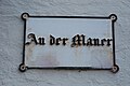 Historisches Straßenschild in Lübeck "An der Mauer"