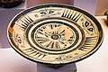 South Ionian Wild Goat Style SiA Id - stemmed dish - frontal faces - Rhodos AM 12079 - 02