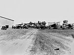 Thumbnail for File:StateLibQld 1 181371 Lined up for the Australian Aerial Derby, 1924.jpg