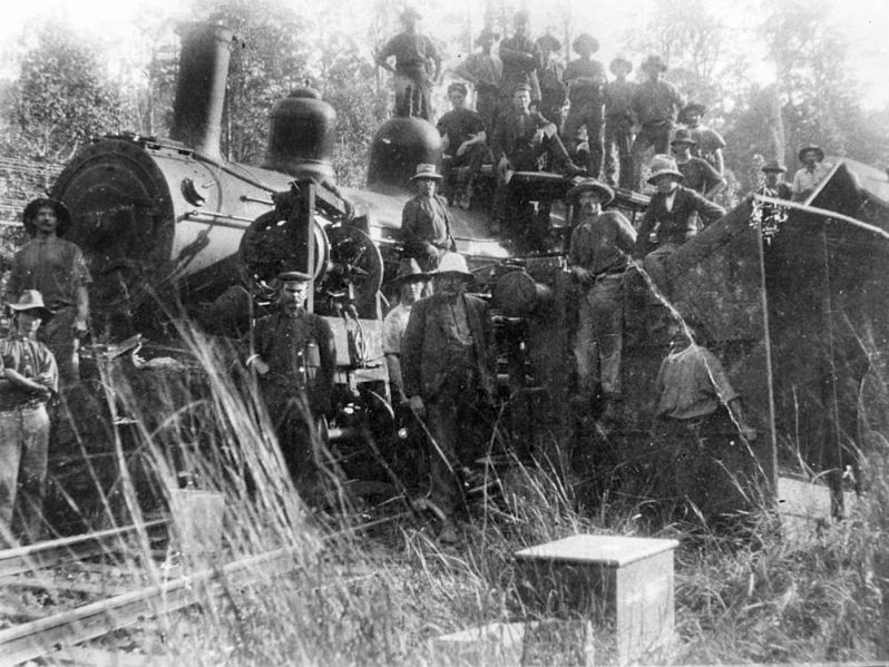 File:StateLibQld 2 163031 Railway workers posing with a derailed locomotive at Eudlo, 1914.jpg