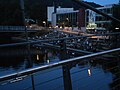 Summer evening with people sitting and talking on terrace between 2 bridges of river Lahn in university city Marburg 2017-06-21.jpg