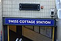 An entrance sign via Eton Avenue to Swiss Cottage tube station