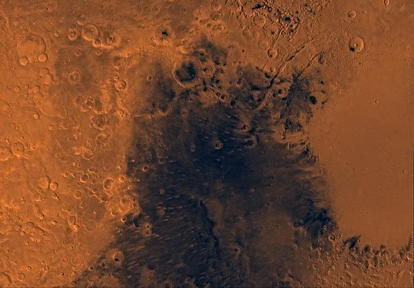 Mars digital-image mosaic merged with color of the MC-13 quadrangle, Syrtis Major region of Mars.