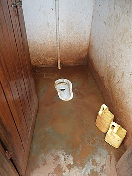 Inside of cubicle in public toilet in informal settlement in Kampala, Uganda