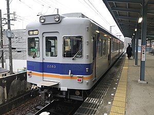 Train of Takashinohama Line at Takashinohama Station.jpg