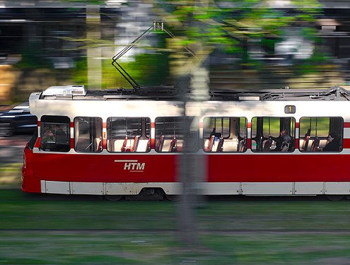 Passengers on the move in a tram, Delft