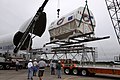 Node 3 being hoisted by cranes before loading onto truck