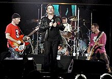 U2 performing in Berlin in July 2001 during their Elevation Tour U2 Elevation Tour Berlin 2001-07-29 (18351610).jpg