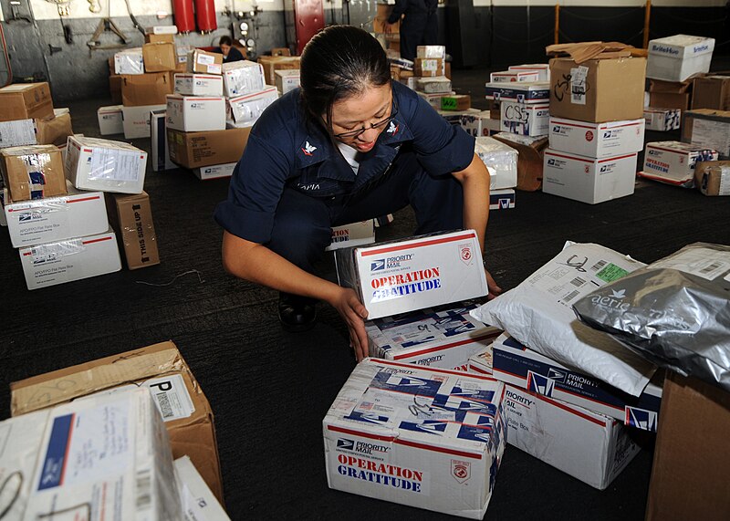 File:US Navy 090108-N-2562S-004 Interior Communications Electrician 3rd Class Erica Tapia picks up a load of.jpg