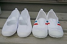 In many Japanese schools, students take off their outdoor shoes and wear uwabaki, an indoor soft slipper. Uwabaki.jpg