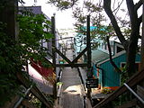 Looking along a dock in Westlake, with floating homes on either side.