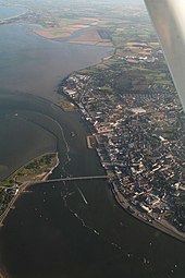 The bridge spans the Slaney, joining Ferrybank to Wexford town Wexford- aerial 2015 (geograph 4689373).jpg