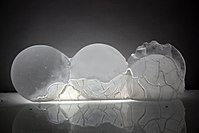 Microworld III, molten glass, cut engraving, 22 x 64 x 7 cm, 2012