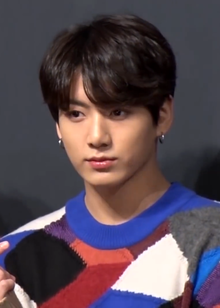 180524 Jungkook at a press conference for Love Yourself Tear (1).png