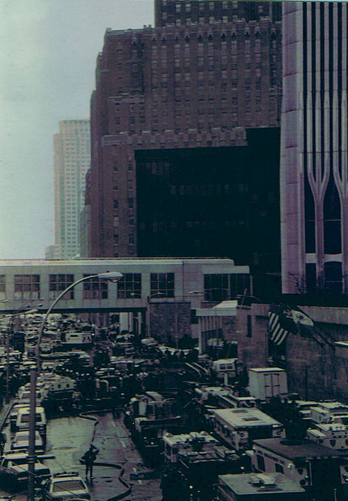 Image of the procession of rescue vehicles responding to the 1993 World Trade Center bombing. 1 World Trade Center is on the far right of the frame.