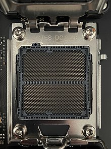 Image of the AM5 socket with the Socket Actuation Mechanism (SAM) in open position, exposing the pins AM5 Socket Open.jpg