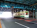 Arakawa tram under Oji viaduct (289766284).jpg