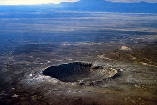 <span class="mw-page-title-main">Crater</span> Depression caused by an impact or geologic activity