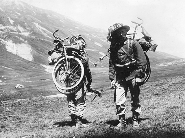 Italian Bersaglieri during World War I with folding bicycles strapped to their backs (1917)