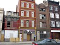 Various empty buildings on Vine Street.